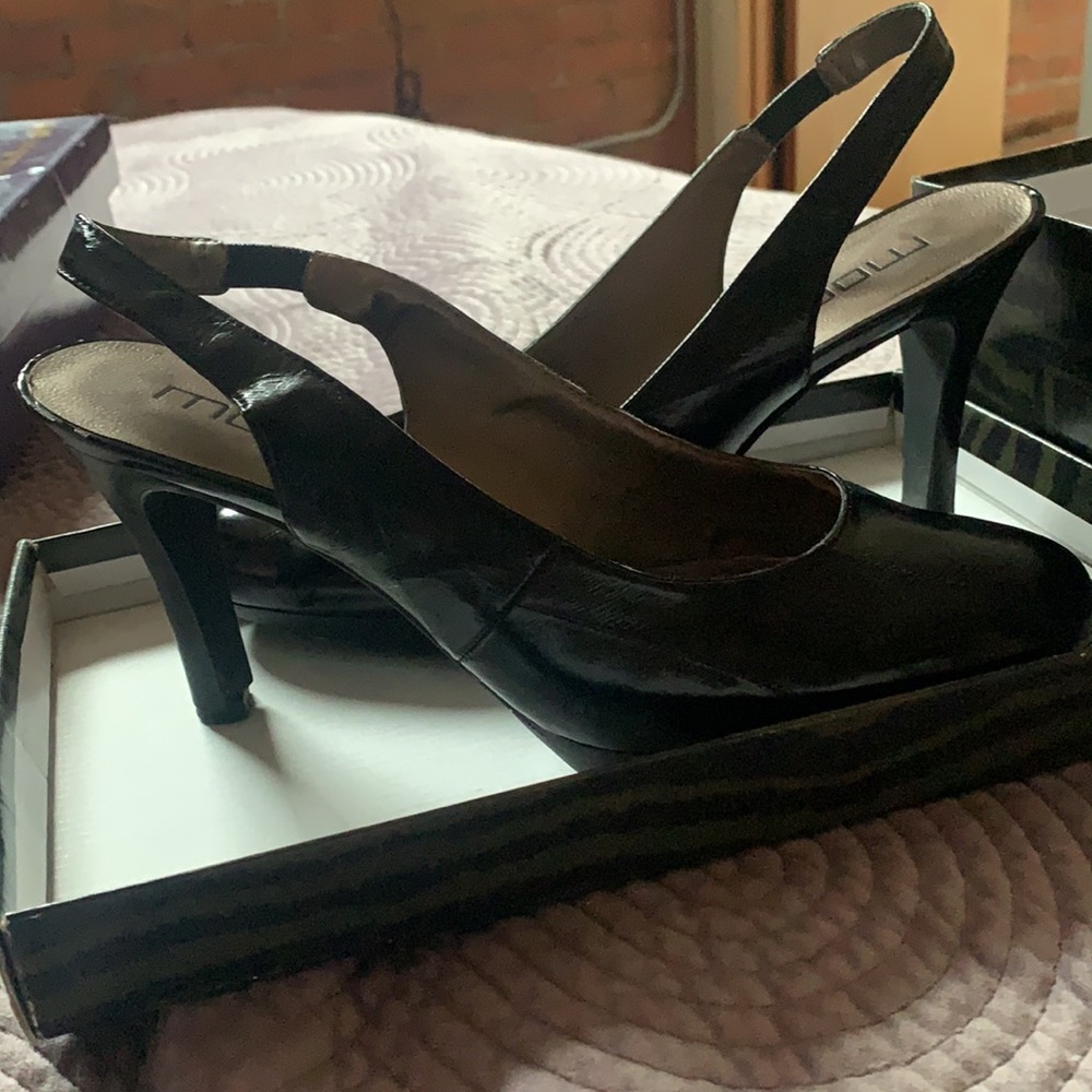 Black patent leather sling backs
